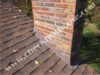 Chimney inspection - metal flashing on a brick chimney