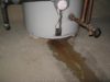 House maintenance - water heater leaking from underneath
