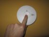 As a part of smoke alarm maintenance test the alarm once a week by pressing the Test-Reset button