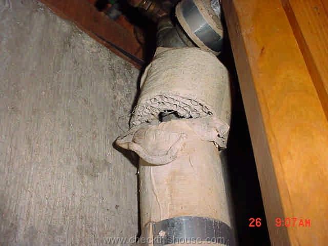 suspect asbestos containing insulation on water pipe